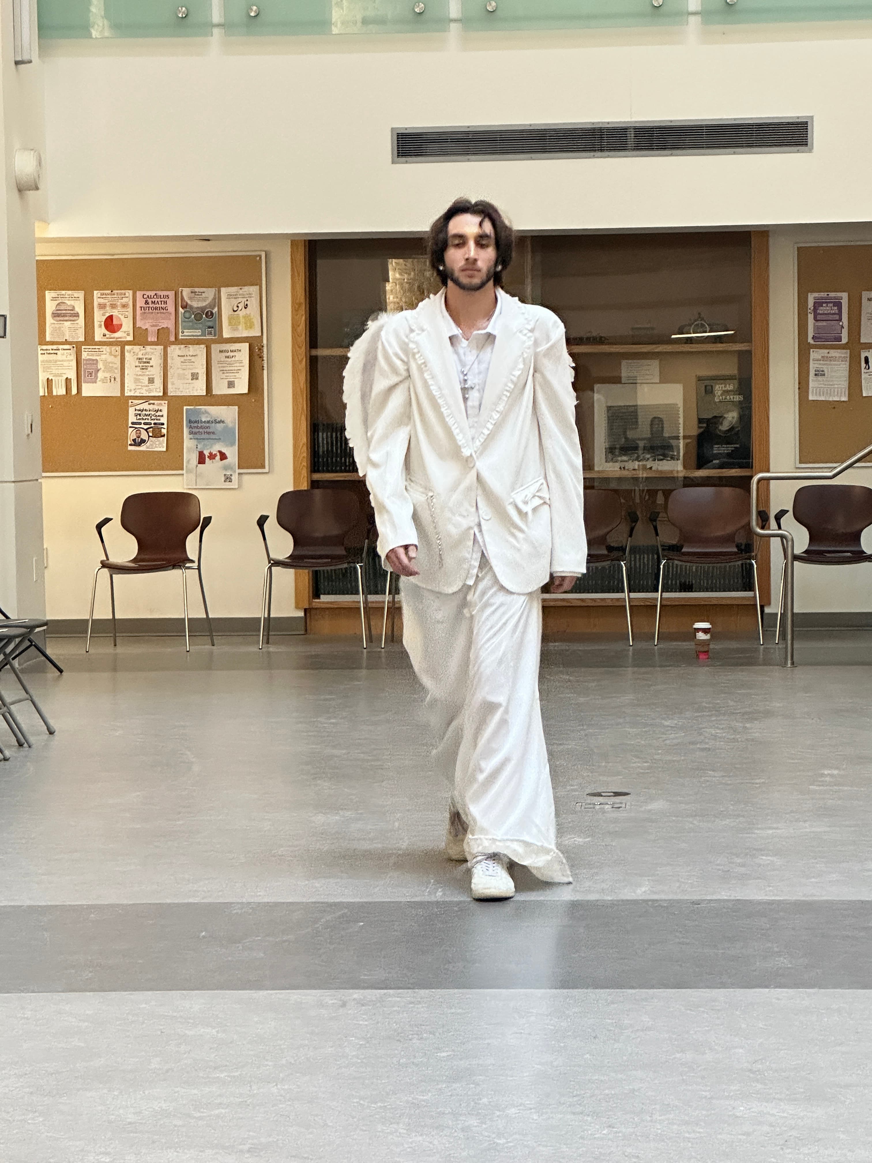 Runway look 21 from Revelations collection